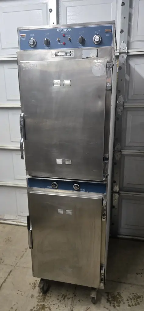 ALTO SHAAM 2 DOOR COOK AND HOLD ON CASTERS NSF