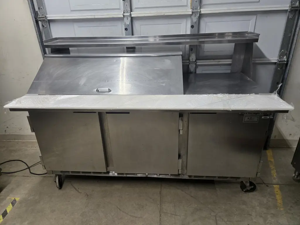 BEVERAGE AIR 3 DOOR PREP TABLE ON CASTERS