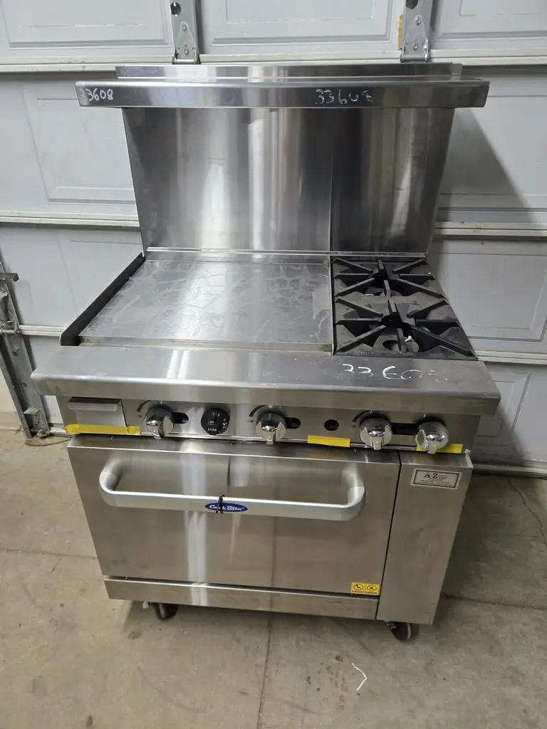 "COOK RITE RANGE WITH 23 GRIDDLE ON LEFT AND 2 INLINE 12 X 12 BURNERS RIGHT S/S OVERSHELF ON CASTERS - NO INTERIOR FAN - ETL APPROVED"""