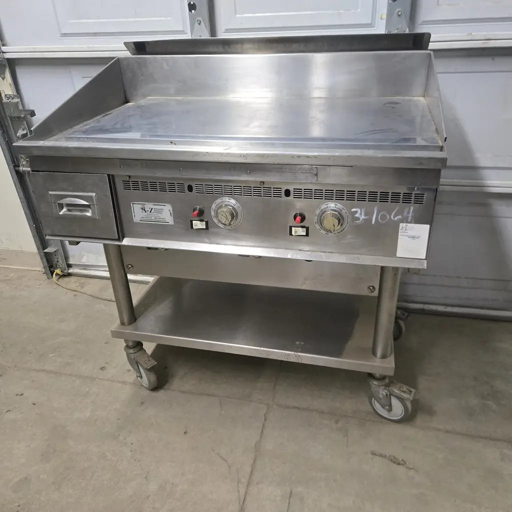 KEATING 36IN MIRACLEAN NATURAL GAS GRIDDLE ON CASTERS WITH THERMOSTATIC CONTROLS