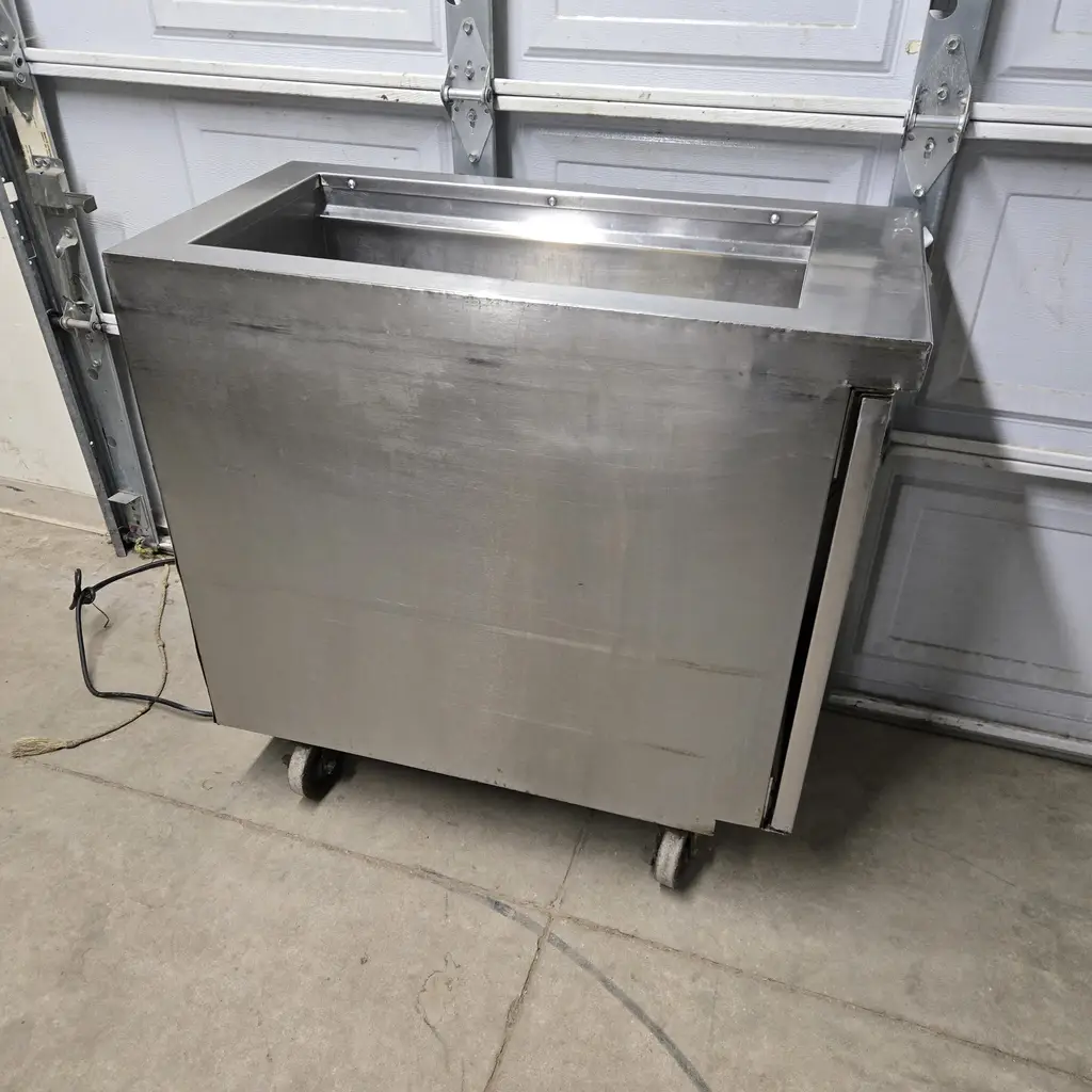 DELFIELD BATCH FREEZER AND FROZEN PRODUCT HOLDER ON CASTERS NSF